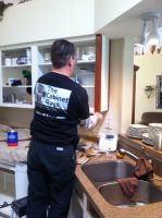 Veneer is applied to the cabinet boxes 